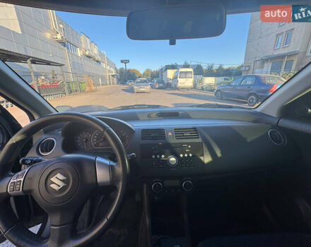 Черный Сузуки Свифт, объемом двигателя 1.33 л и пробегом 85 тыс. км за 6000 $, фото 14 на Automoto.ua