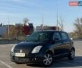 Черный Сузуки Свифт, объемом двигателя 1.33 л и пробегом 241 тыс. км за 4800 $, фото 1 на Automoto.ua