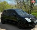 Черный Сузуки Свифт, объемом двигателя 1.33 л и пробегом 150 тыс. км за 4500 $, фото 3 на Automoto.ua