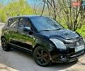 Черный Сузуки Свифт, объемом двигателя 1.33 л и пробегом 150 тыс. км за 4500 $, фото 1 на Automoto.ua