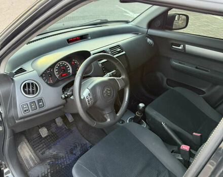 Чорний Сузукі Свифт, об'ємом двигуна 1.33 л та пробігом 199 тис. км за 4799 $, фото 21 на Automoto.ua