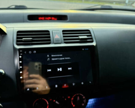 Чорний Сузукі Свифт, об'ємом двигуна 1.33 л та пробігом 199 тис. км за 4799 $, фото 19 на Automoto.ua