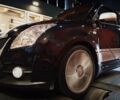 Черный Сузуки Свифт, объемом двигателя 1.59 л и пробегом 129 тыс. км за 8300 $, фото 1 на Automoto.ua