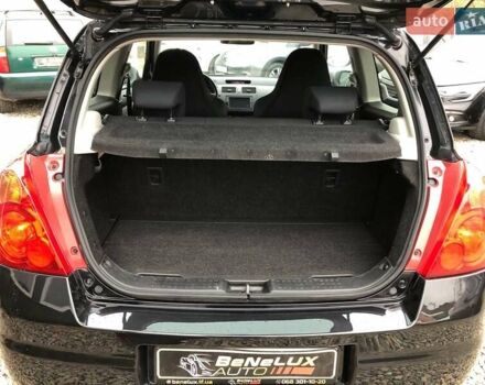 Черный Сузуки Свифт, объемом двигателя 1.59 л и пробегом 130 тыс. км за 8299 $, фото 13 на Automoto.ua