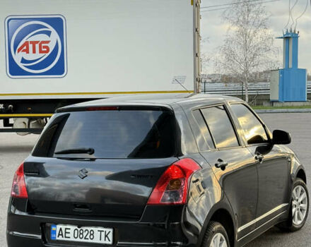 Чорний Сузукі Свифт, об'ємом двигуна 1.33 л та пробігом 199 тис. км за 4799 $, фото 10 на Automoto.ua