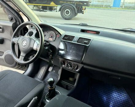 Чорний Сузукі Свифт, об'ємом двигуна 1.33 л та пробігом 199 тис. км за 4799 $, фото 12 на Automoto.ua