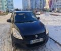 Чорний Сузукі Свифт, об'ємом двигуна 1.24 л та пробігом 129 тис. км за 5999 $, фото 1 на Automoto.ua