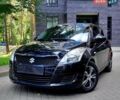 Черный Сузуки Свифт, объемом двигателя 1.25 л и пробегом 123 тыс. км за 8599 $, фото 1 на Automoto.ua