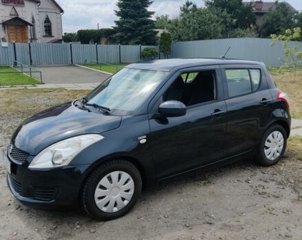 Чорний Сузукі Свифт, об'ємом двигуна 1.3 л та пробігом 184 тис. км за 5796 $, фото 1 на Automoto.ua
