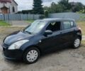 Чорний Сузукі Свифт, об'ємом двигуна 1.3 л та пробігом 184 тис. км за 5796 $, фото 1 на Automoto.ua