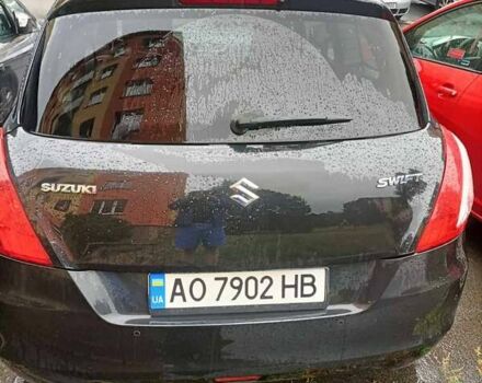 Черный Сузуки Свифт, объемом двигателя 1.2 л и пробегом 195 тыс. км за 5700 $, фото 1 на Automoto.ua