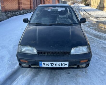 Черный Сузуки Свифт, объемом двигателя 1.3 л и пробегом 222 тыс. км за 400 $, фото 1 на Automoto.ua