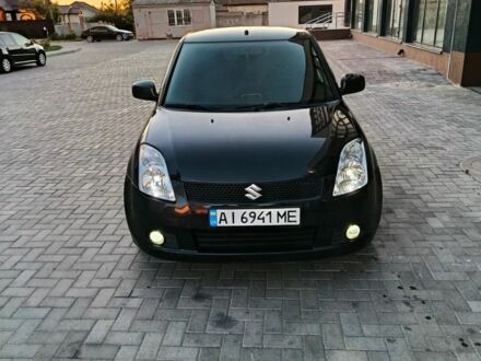 Чорний Сузукі Свифт, об'ємом двигуна 1.3 л та пробігом 220 тис. км за 4100 $, фото 1 на Automoto.ua