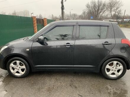 Чорний Сузукі Свифт, об'ємом двигуна 1.3 л та пробігом 245 тис. км за 4300 $, фото 1 на Automoto.ua