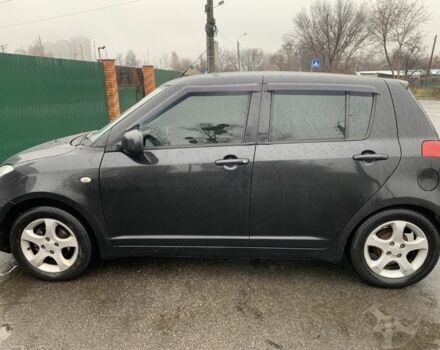 Черный Сузуки Свифт, объемом двигателя 1.3 л и пробегом 245 тыс. км за 4300 $, фото 1 на Automoto.ua