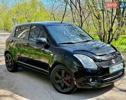 Черный Сузуки Свифт, объемом двигателя 1.33 л и пробегом 150 тыс. км за 3900 $, фото 1 на Automoto.ua