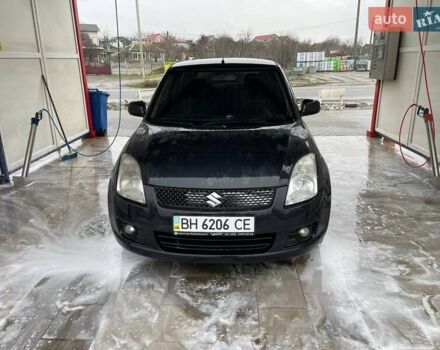 Черный Сузуки Свифт, объемом двигателя 1.33 л и пробегом 232 тыс. км за 4000 $, фото 1 на Automoto.ua
