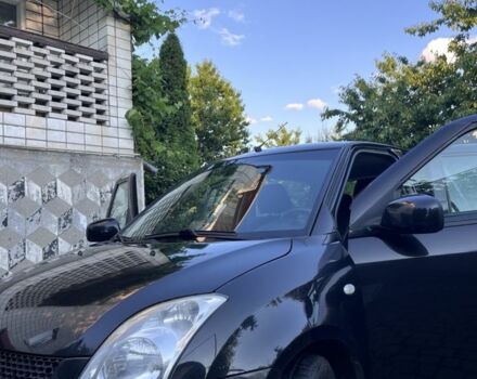 Черный Сузуки Свифт, объемом двигателя 1.3 л и пробегом 97 тыс. км за 5800 $, фото 1 на Automoto.ua