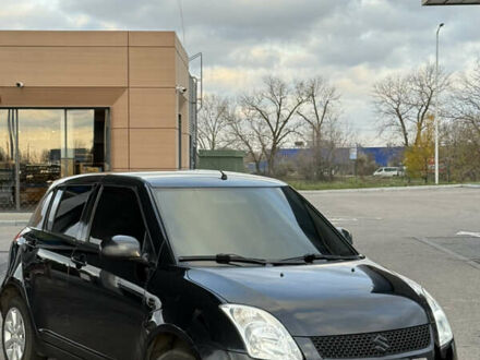 Черный Сузуки Свифт, объемом двигателя 1.33 л и пробегом 199 тыс. км за 4799 $, фото 1 на Automoto.ua