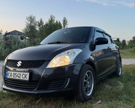 Чорний Сузукі Свифт, об'ємом двигуна 1.24 л та пробігом 182 тис. км за 4500 $, фото 1 на Automoto.ua