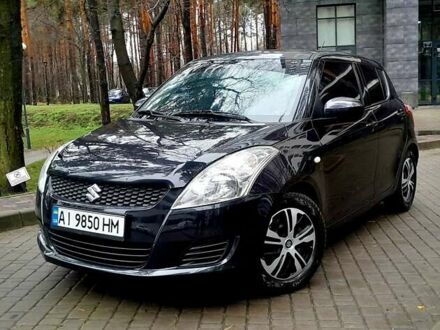 Чорний Сузукі Свифт, об'ємом двигуна 1.25 л та пробігом 126 тис. км за 8399 $, фото 1 на Automoto.ua