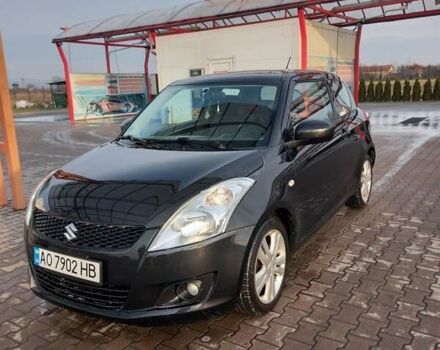 Чорний Сузукі Свифт, об'ємом двигуна 1.2 л та пробігом 195 тис. км за 5700 $, фото 1 на Automoto.ua