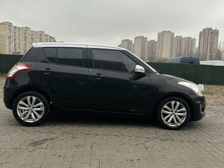 Черный Сузуки Свифт, объемом двигателя 1.24 л и пробегом 103 тыс. км за 10200 $, фото 1 на Automoto.ua