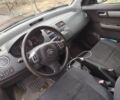 Красный Сузуки Свифт, объемом двигателя 1.3 л и пробегом 250 тыс. км за 4000 $, фото 3 на Automoto.ua