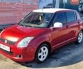 Красный Сузуки Свифт, объемом двигателя 1.33 л и пробегом 190 тыс. км за 4300 $, фото 1 на Automoto.ua