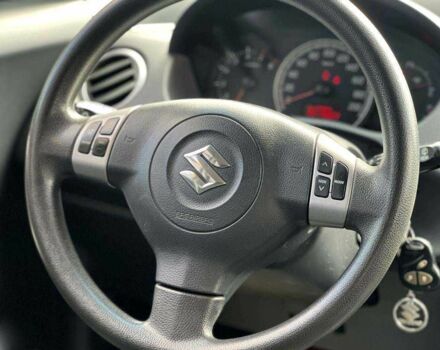 Красный Сузуки Свифт, объемом двигателя 1.3 л и пробегом 178 тыс. км за 5500 $, фото 11 на Automoto.ua