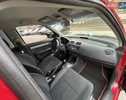 Красный Сузуки Свифт, объемом двигателя 1.33 л и пробегом 178 тыс. км за 3999 $, фото 18 на Automoto.ua