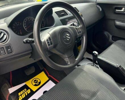Красный Сузуки Свифт, объемом двигателя 1.3 л и пробегом 178 тыс. км за 5500 $, фото 7 на Automoto.ua