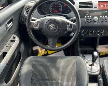 Красный Сузуки Свифт, объемом двигателя 1.33 л и пробегом 178 тыс. км за 5500 $, фото 12 на Automoto.ua