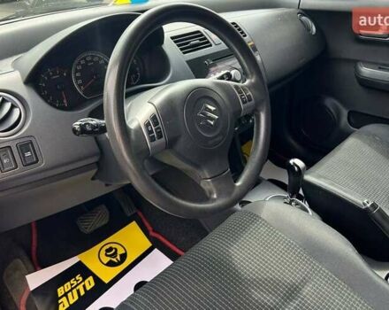 Красный Сузуки Свифт, объемом двигателя 1.33 л и пробегом 178 тыс. км за 5500 $, фото 7 на Automoto.ua