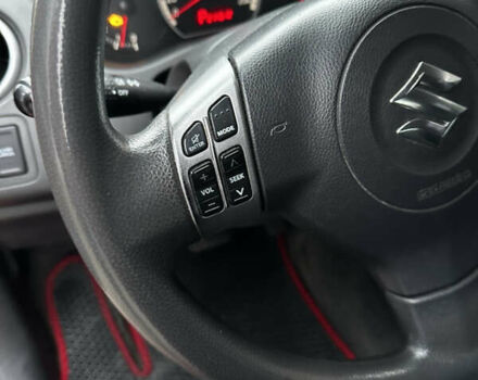 Червоний Сузукі Свифт, об'ємом двигуна 1.49 л та пробігом 215 тис. км за 5800 $, фото 9 на Automoto.ua