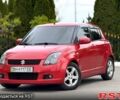 Червоний Сузукі Свифт, об'ємом двигуна 1.3 л та пробігом 229 тис. км за 4999 $, фото 1 на Automoto.ua