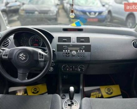 Красный Сузуки Свифт, объемом двигателя 1.33 л и пробегом 178 тыс. км за 5500 $, фото 13 на Automoto.ua