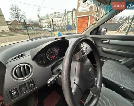 Красный Сузуки Свифт, объемом двигателя 1.33 л и пробегом 178 тыс. км за 3999 $, фото 16 на Automoto.ua