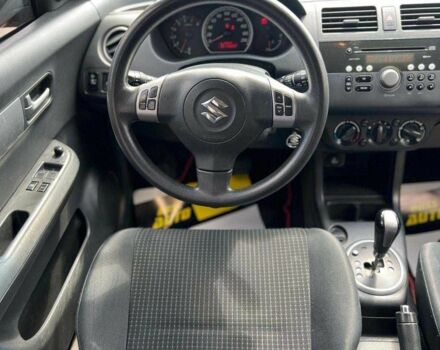 Красный Сузуки Свифт, объемом двигателя 1.3 л и пробегом 178 тыс. км за 5500 $, фото 12 на Automoto.ua