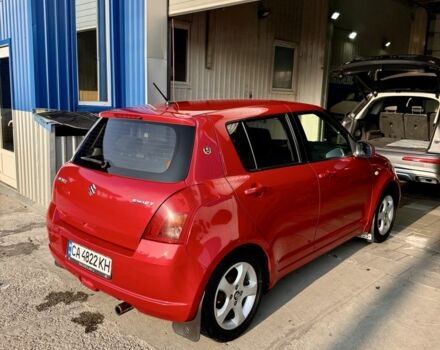 Красный Сузуки Свифт, объемом двигателя 1.3 л и пробегом 210 тыс. км за 5200 $, фото 2 на Automoto.ua