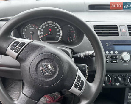 Красный Сузуки Свифт, объемом двигателя 1.3 л и пробегом 175 тыс. км за 5200 $, фото 14 на Automoto.ua