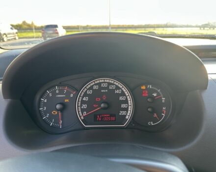 Червоний Сузукі Свифт, об'ємом двигуна 1.3 л та пробігом 130 тис. км за 4900 $, фото 6 на Automoto.ua