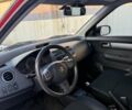 Червоний Сузукі Свифт, об'ємом двигуна 1.33 л та пробігом 147 тис. км за 4900 $, фото 7 на Automoto.ua
