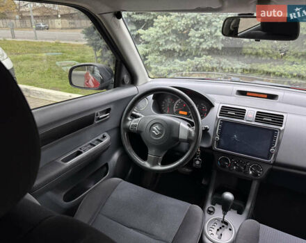 Червоний Сузукі Свифт, об'ємом двигуна 1.49 л та пробігом 160 тис. км за 5300 $, фото 29 на Automoto.ua