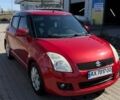 Червоний Сузукі Свифт, об'ємом двигуна 1.33 л та пробігом 140 тис. км за 6000 $, фото 1 на Automoto.ua
