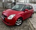 Червоний Сузукі Свифт, об'ємом двигуна 1.5 л та пробігом 148 тис. км за 5700 $, фото 1 на Automoto.ua