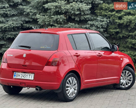 Червоний Сузукі Свифт, об'ємом двигуна 1.49 л та пробігом 160 тис. км за 5300 $, фото 16 на Automoto.ua