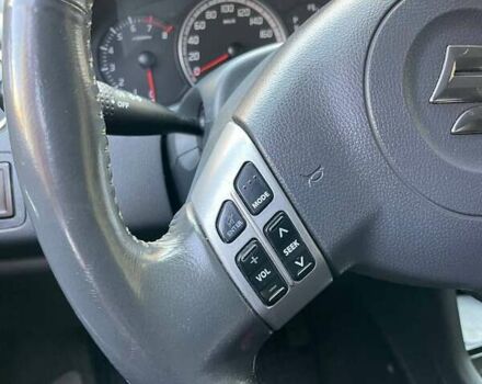 Красный Сузуки Свифт, объемом двигателя 1.49 л и пробегом 200 тыс. км за 6500 $, фото 11 на Automoto.ua