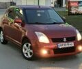 Червоний Сузукі Свифт, об'ємом двигуна 1.33 л та пробігом 112 тис. км за 5800 $, фото 1 на Automoto.ua