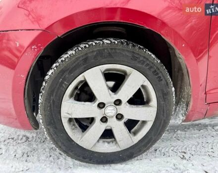 Червоний Сузукі Свифт, об'ємом двигуна 1.49 л та пробігом 174 тис. км за 5500 $, фото 25 на Automoto.ua